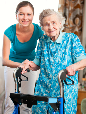caregiver assisting old woman